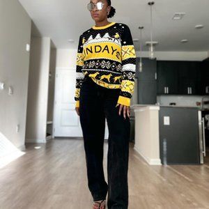 Yellow and Black sweater.
